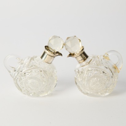 A Pair of Cut Glass Oil Decanters by John Grinsell and Sons