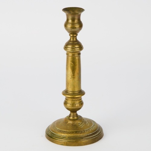 A Pair of Bronze Candlestick Holders