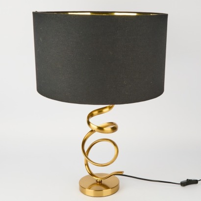 A Contemporary Gold Coloured Swirl Lamp