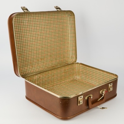 A Vintage Flight Suitcase with Keys