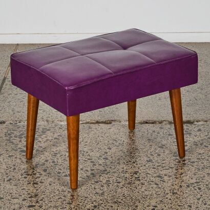 A Mid-Century Purple Vinyl Stool