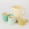 A Set of Four Crown Lynn Jugs