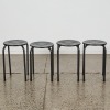A Set of Four Retro Style Metal Stools