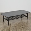 A MCM Ebonised Oak Coffee Table