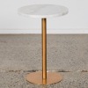 A Small Marble Topped Side Table With Gold Base