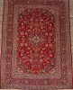 A Large Hand-Knotted Wool Kashan Rug