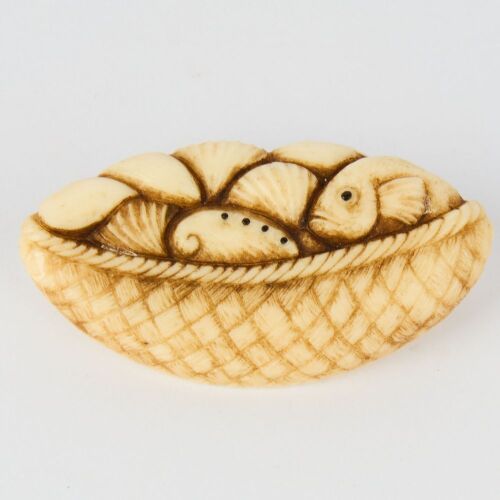 A Hand-Carved Bone Fish in Basket Miniature Sculpture