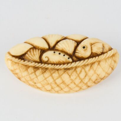 A Hand-Carved Bone Fish in Basket Miniature Sculpture