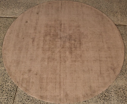 A Calligaris Round Wool Rug