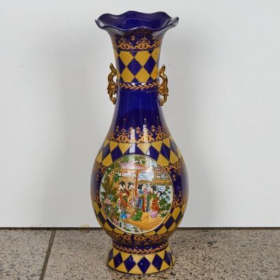 A Japanese Blue and Gilt Decorated 'Figural' Vase with Handles