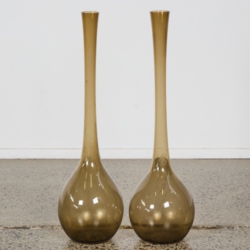A Set of Two Large Handblown Glass Bottles