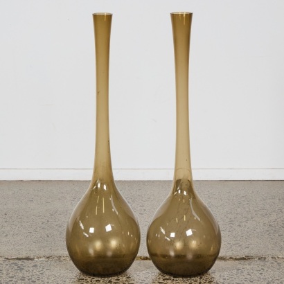 A Set of Two Large Handblown Glass Bottles