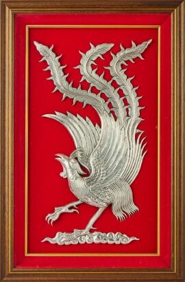 A Framed Phoenix Decoration in silver