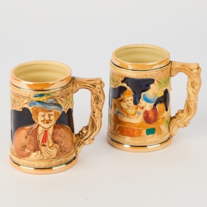 A Pair of Vintage Hand Painted Beer Steins