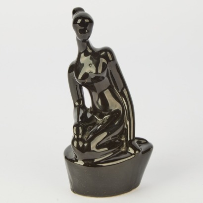 A Mid-Century Woman's Pottery Figurine