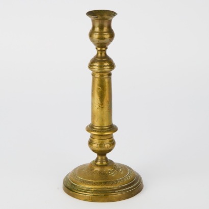 A Pair of Bronze Candlestick Holders