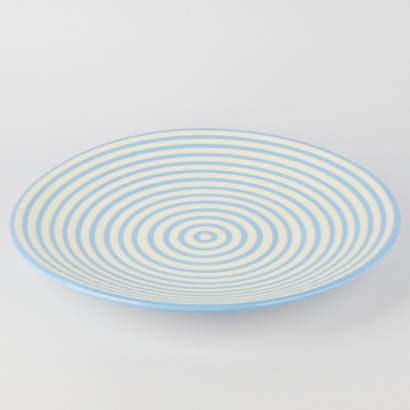 A Gill Gane Large White platter with blue concentric circles
