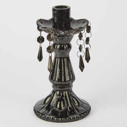 A Black Glass Candlestick