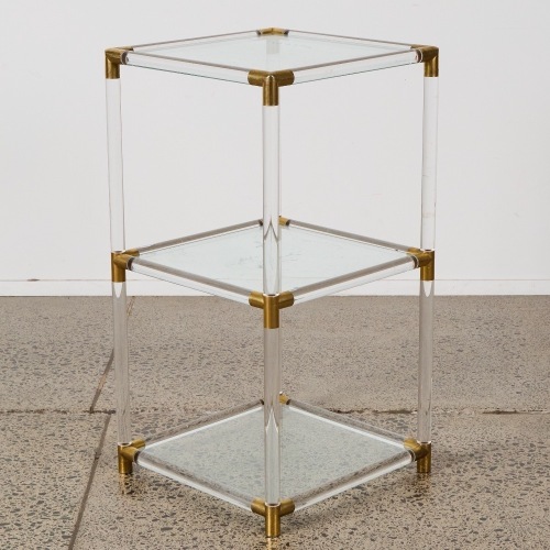 A Lucite and Brass Display Table