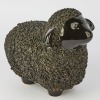 An Ceramic Black Ceramic Sheep Statue