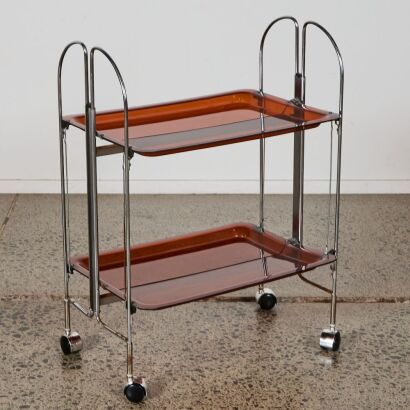 A Mid-century Modern Chrome and Brown Perspex folding Drinks Trolley Circa 1960's