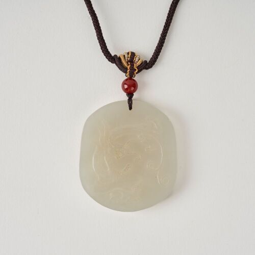 A Chinese White Jade 'Dragon' Pendant