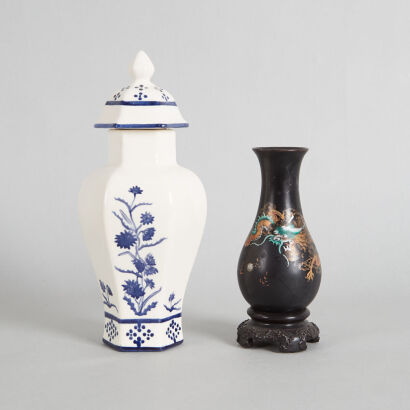 An Oriental Blue and White Vase and A Black Lacquer Gilt 'Dragon' Vase