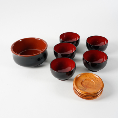 A Group Eleven Japanese Red and Black Lacquered Dinnerwares