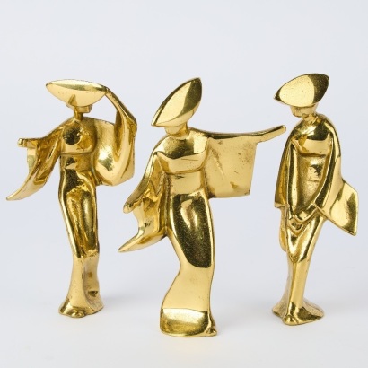 A Set of Three Brass Geisha Figurines
