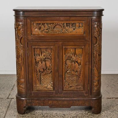 A Chinese Early 20th Century Cabinet Carved with Landscape Scenes