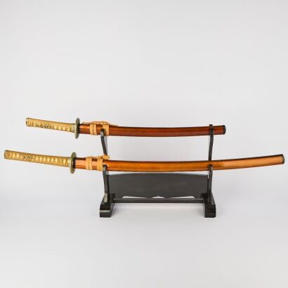 A Pair of Japanese 20th Century Samurai Swords with Original Wooden Stand