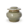 A Chinese Yuan Dynasty Longquan Celadon Jar with Lotus Leaf-Shaped Lid (lid repaired)