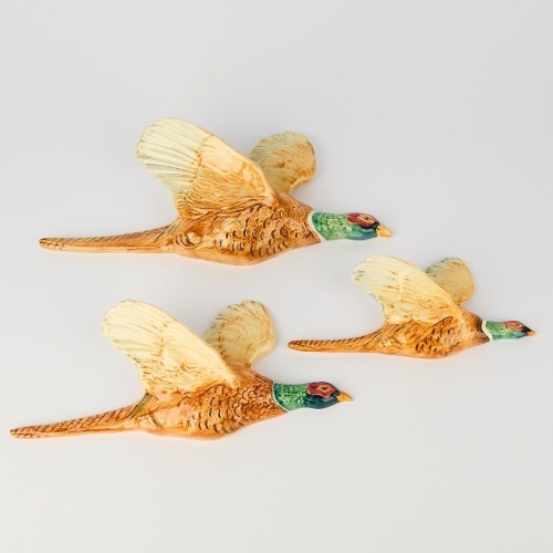 A Trio of Beswick Flying Pheasants