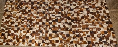 A Cowhide Patchwork Rug