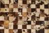 A Cowhide Patchwork Rug
