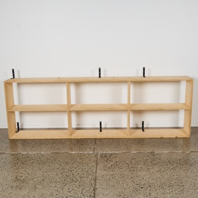 A Set of Wall Hung Plywood Shelves