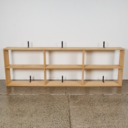 A Set of Wall Hung Plywood Shelves