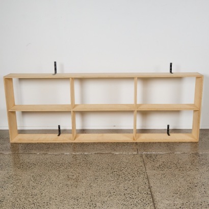 A Set of Wall Hung Plywood Shelves