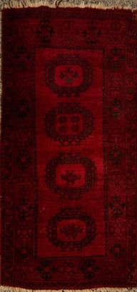 A Vintage Hand-Knotted Turkman Wool Rug