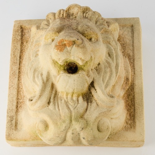 A Stone Fountain Lion Head