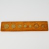 A Set of Coins of Aotearoa Embeded in Wood