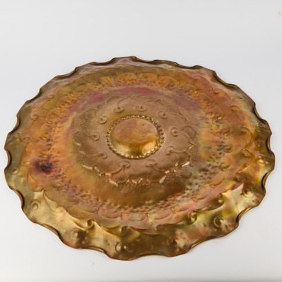 A Large Copper Sunburst Wall Art