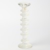 An Iittala Festivo Candlestick by Timo Sarpaneva