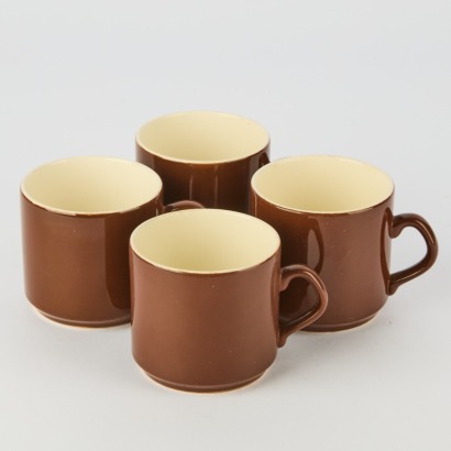 A set of four Crown Lynn Coffee Cups with Dark Brown Glaze