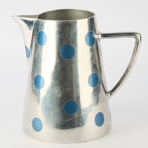 A Large Pewter Jug with Blue Circles