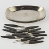 A Set of Eight Mid-Century Stainless Steel Snack Dishes with Forks