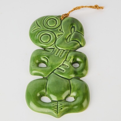 A Ceramic Tiki Wall Hanging