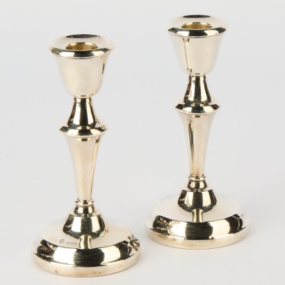A Pair of Sterling Silver Candlesticks