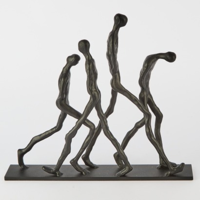A Walking Figures Metal Table Ornament