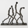 A Walking Figures Metal Table Ornament